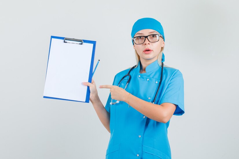 female doctor pointing finger clipboard blue uniform 176474 12832